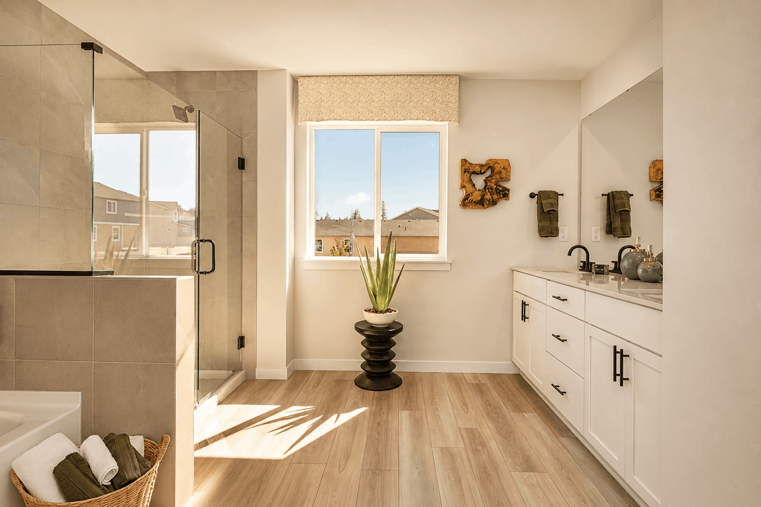 A bathroom with a large window.