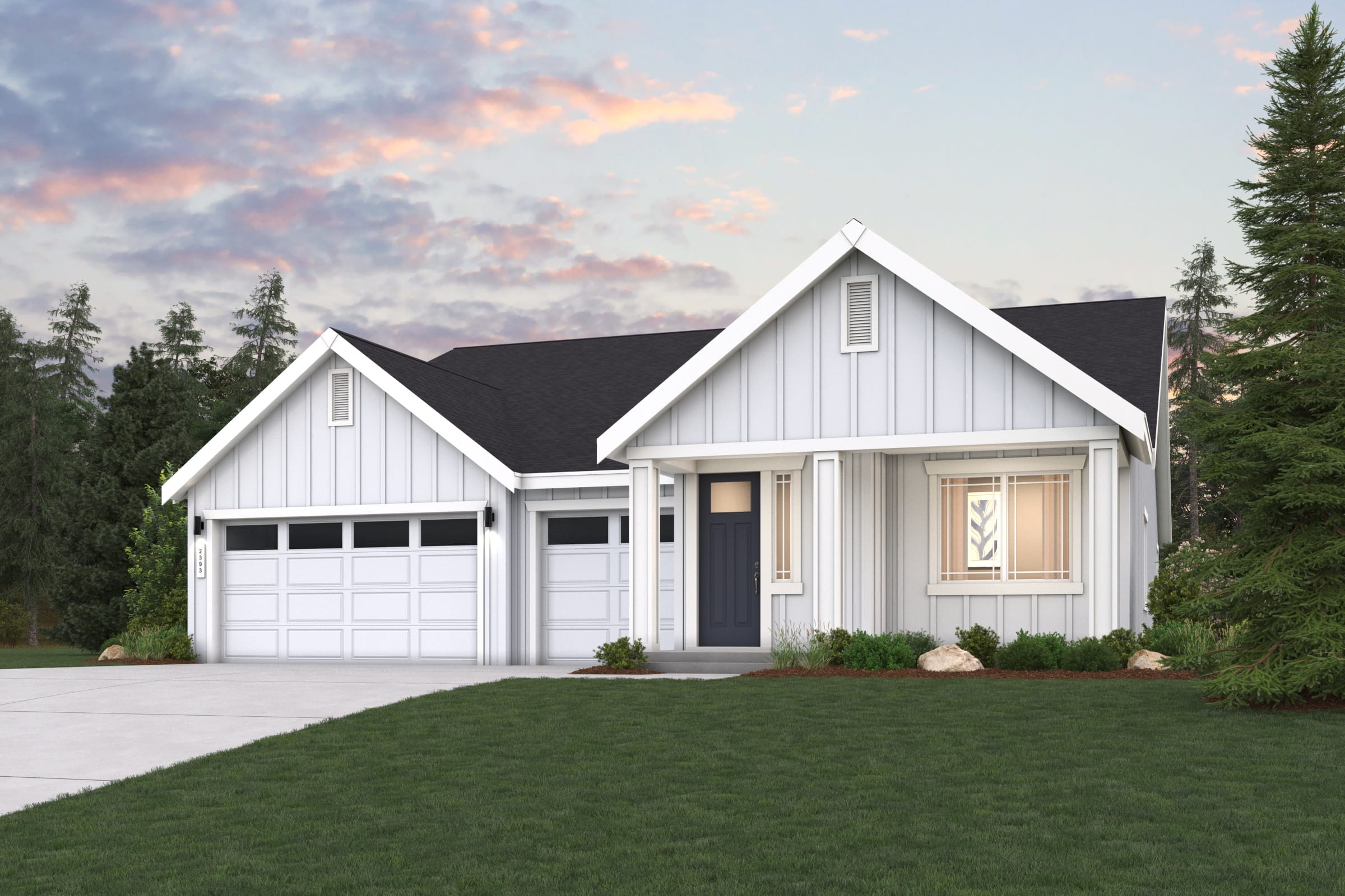 A house with a lawn in front of it.