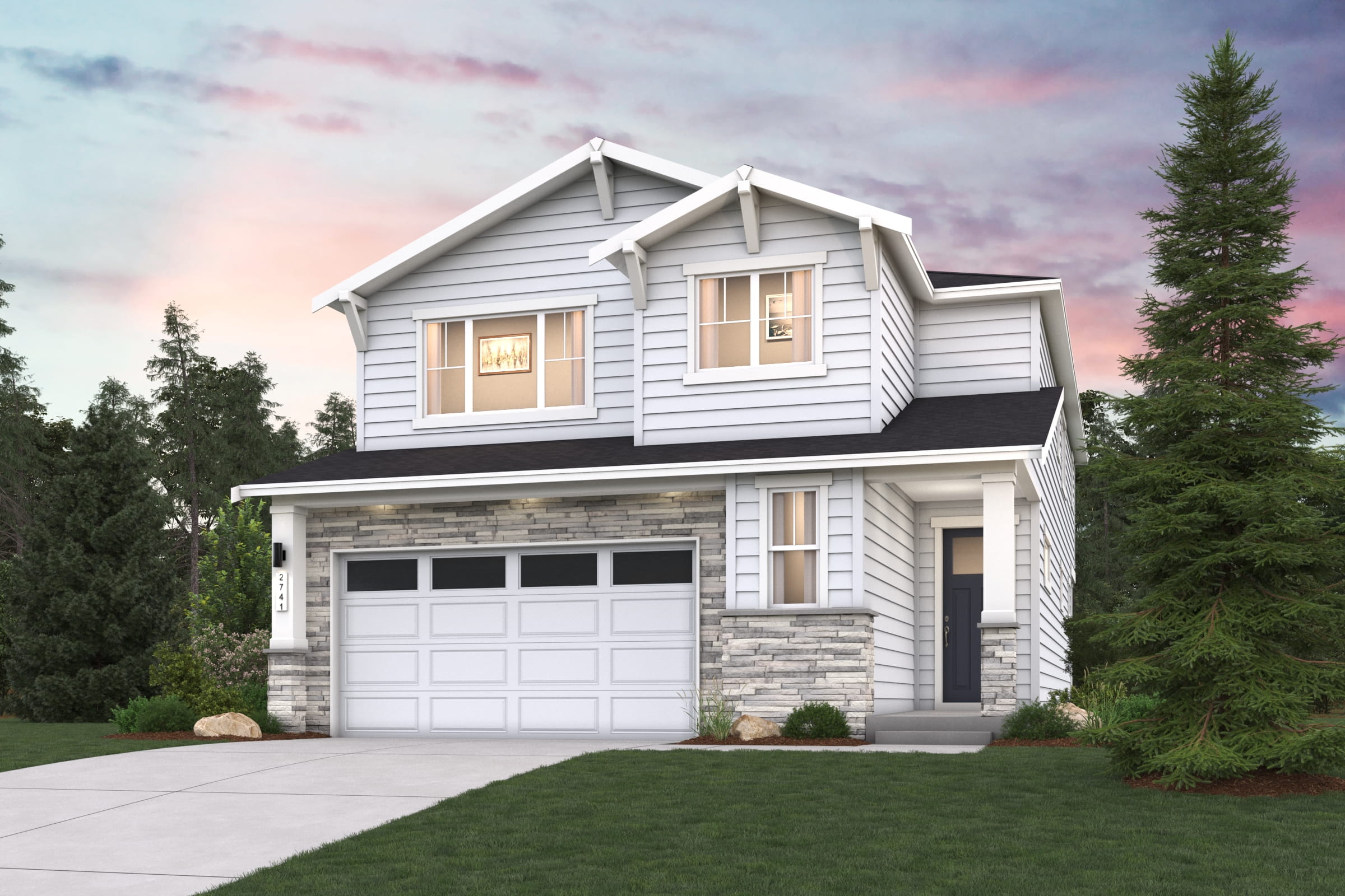 A house with a garage and trees in the back.