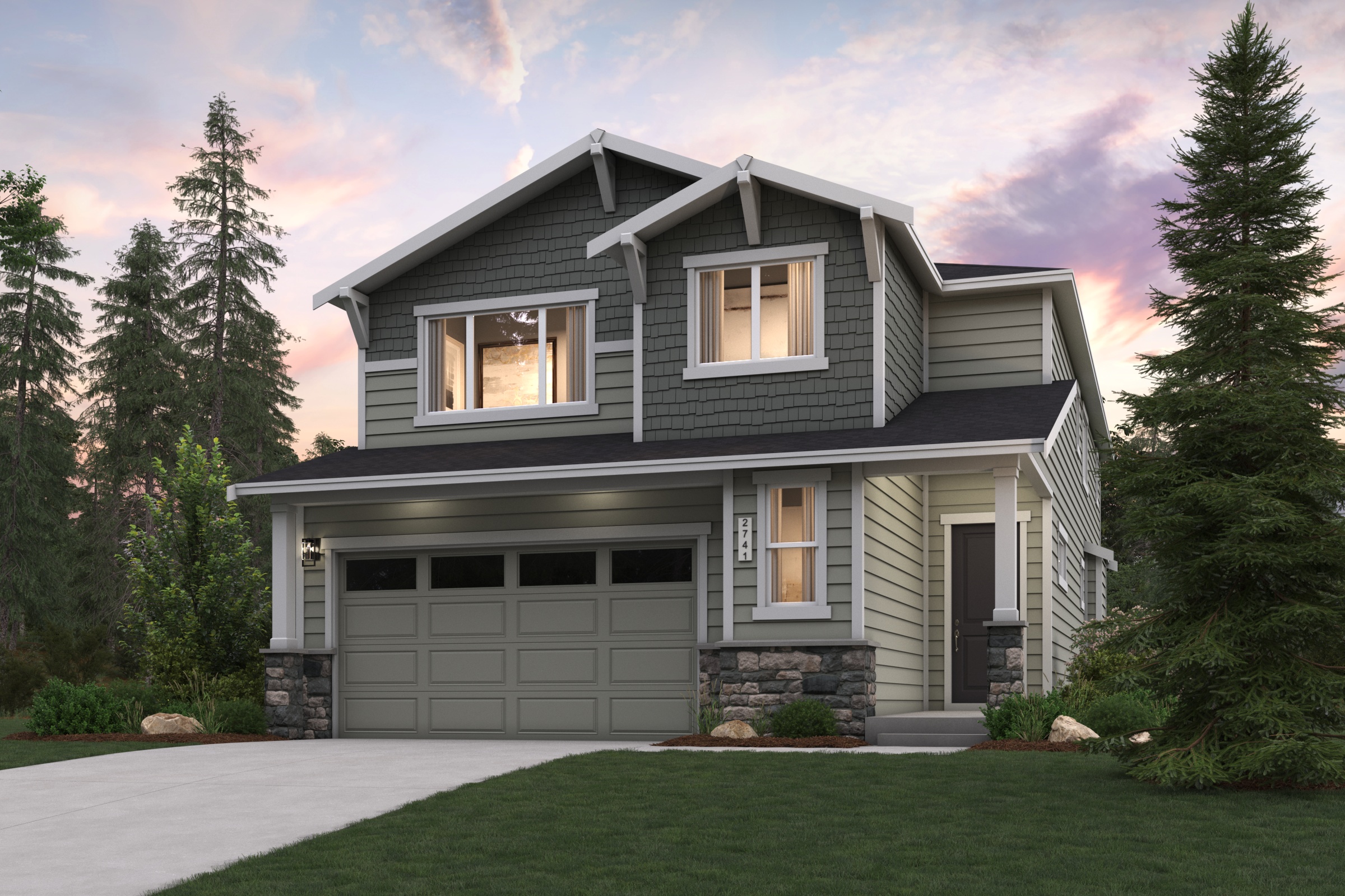 A house with a garage and trees around it.