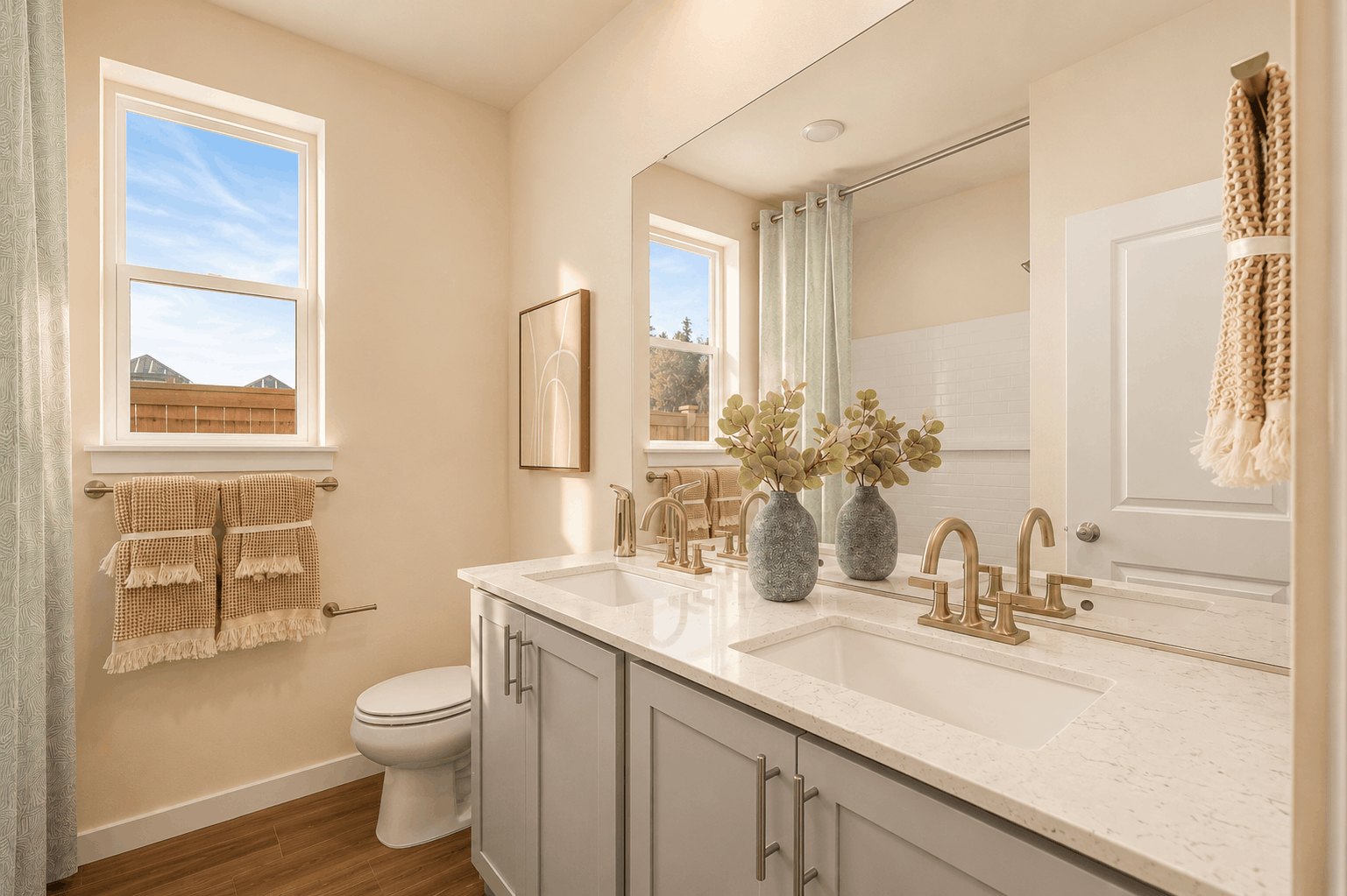A bathroom with a sink and a toilet.