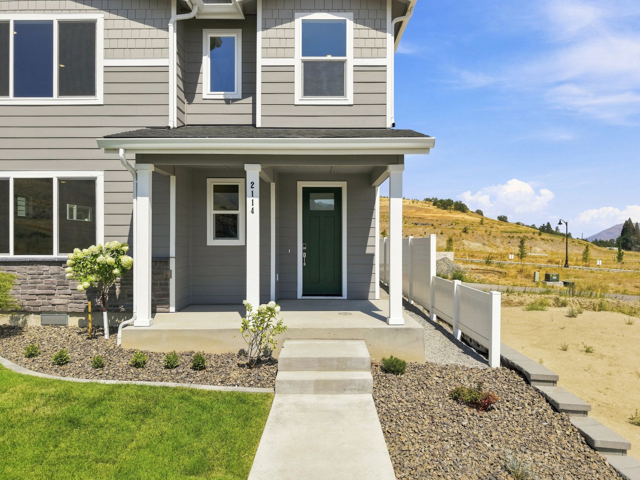 A house with a white fence.