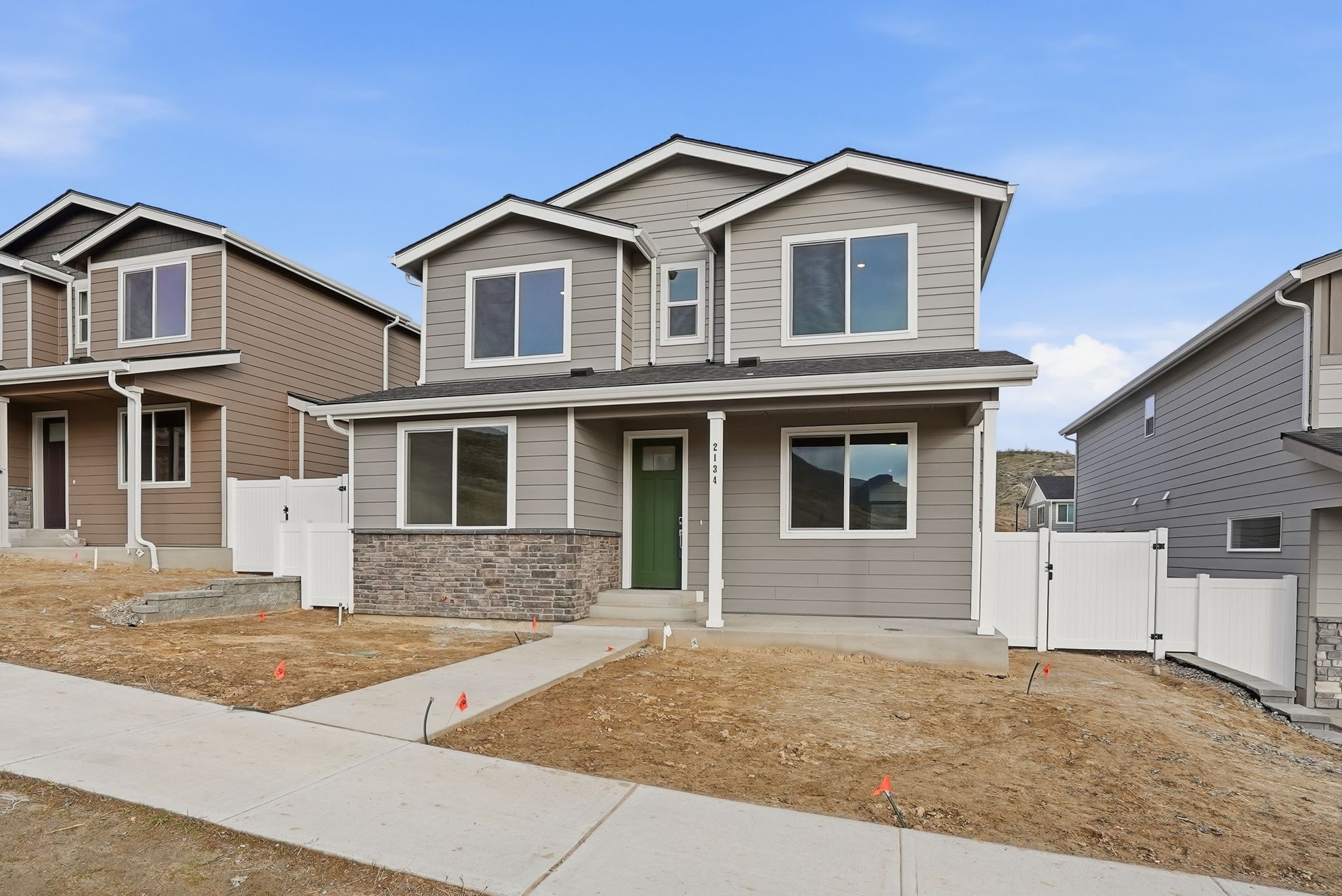 A house with a fence around it.