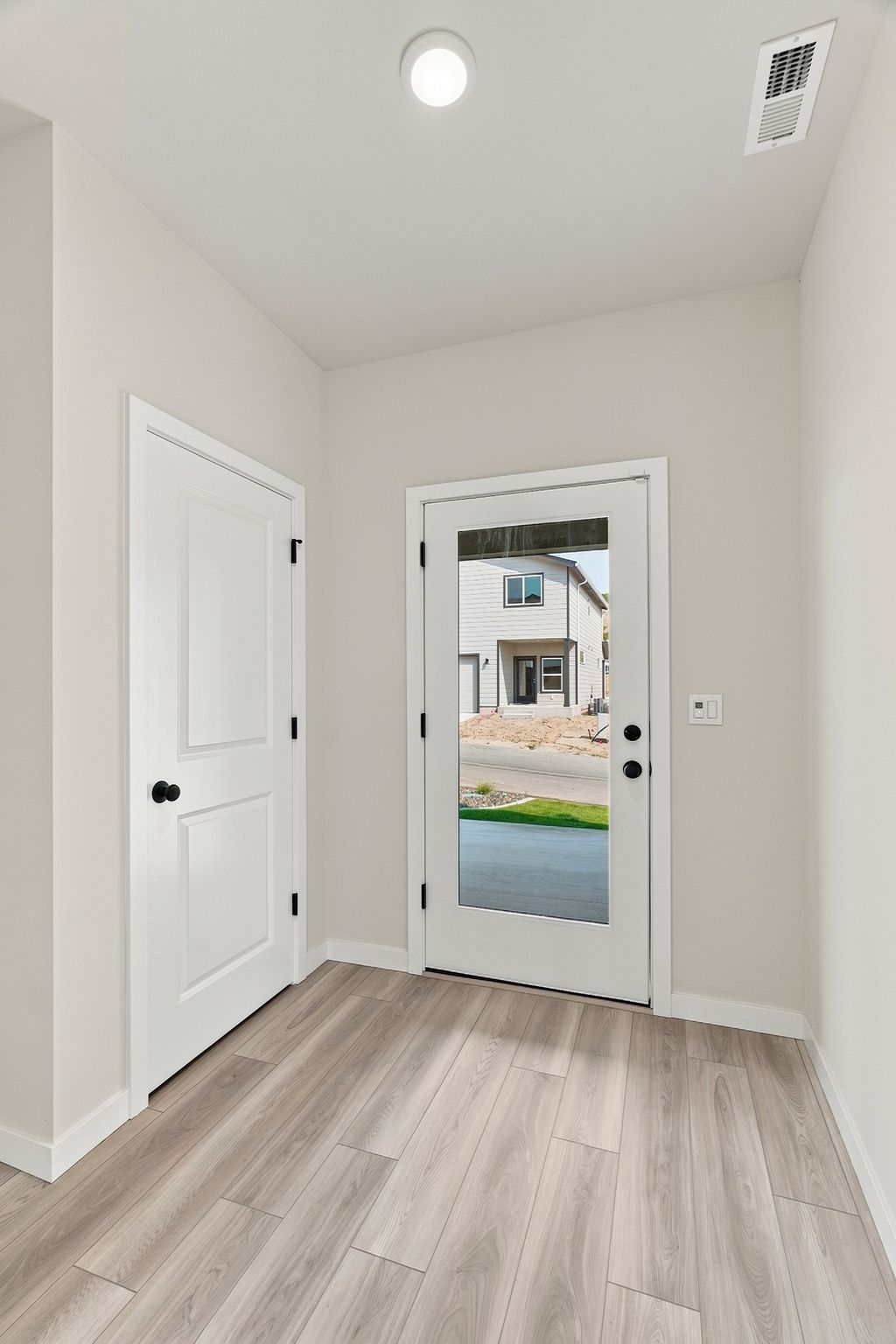A room with white doors.