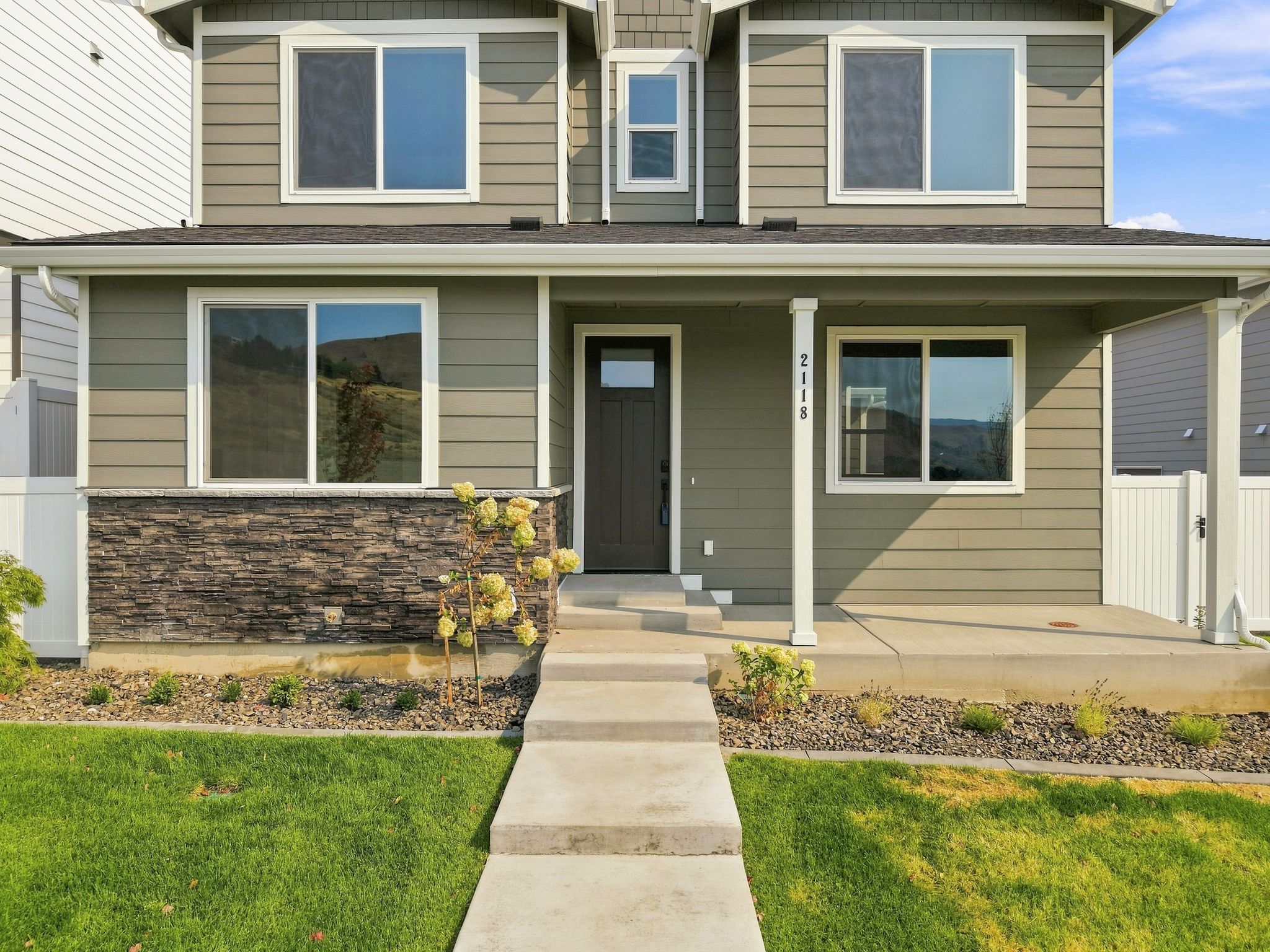 A house with a front yard.