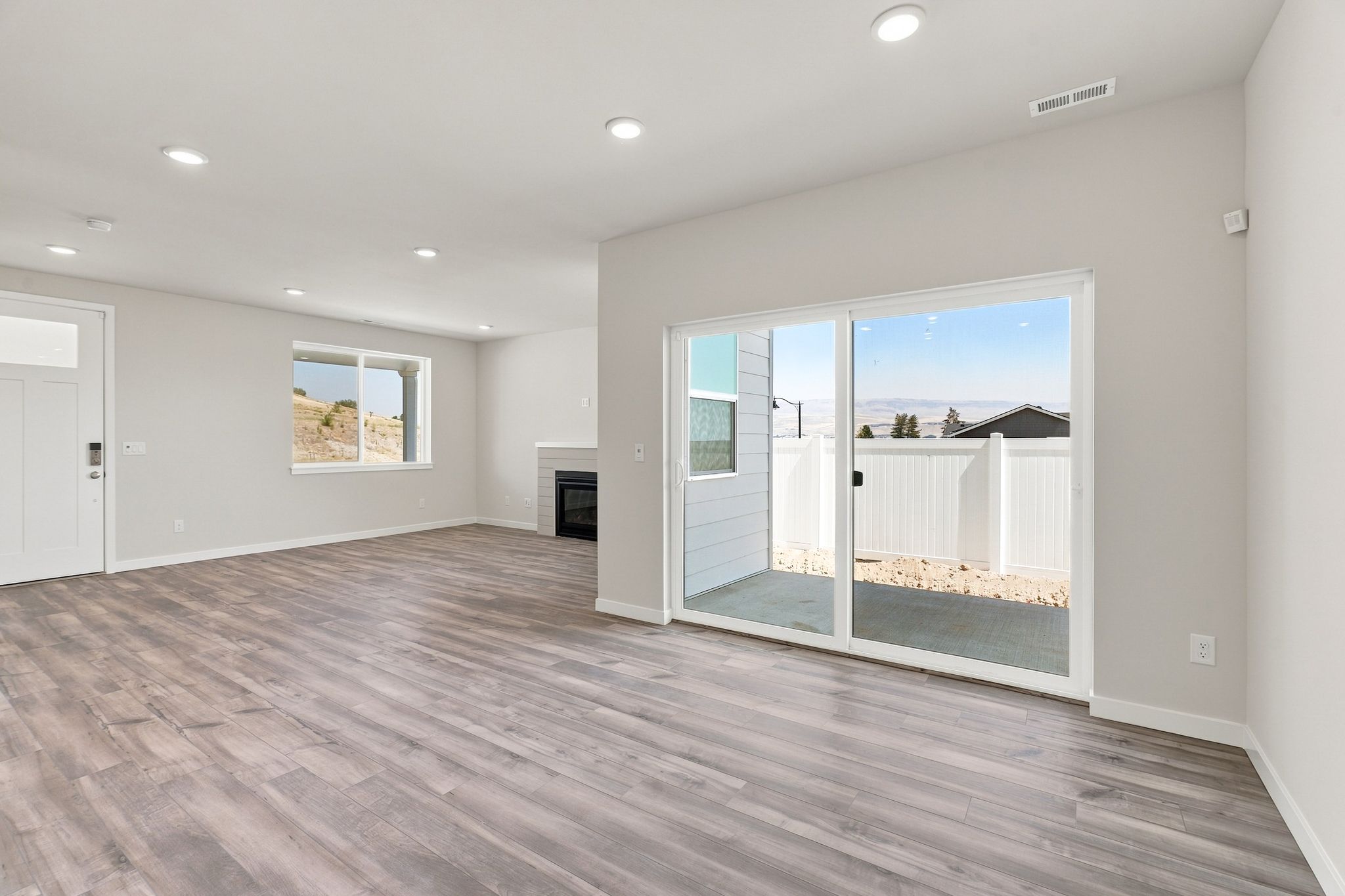 A room with a wood floor and a wood floor.