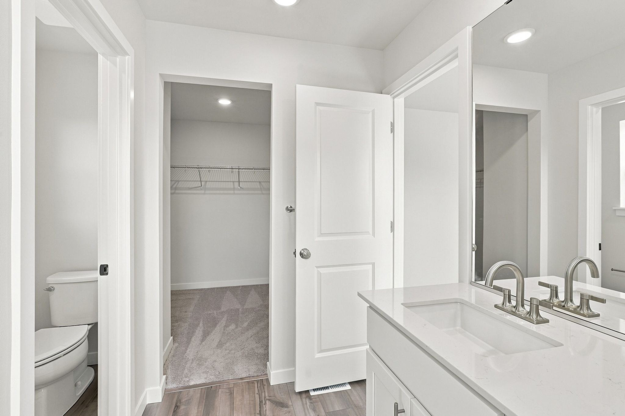 A bathroom with a tub and sink.