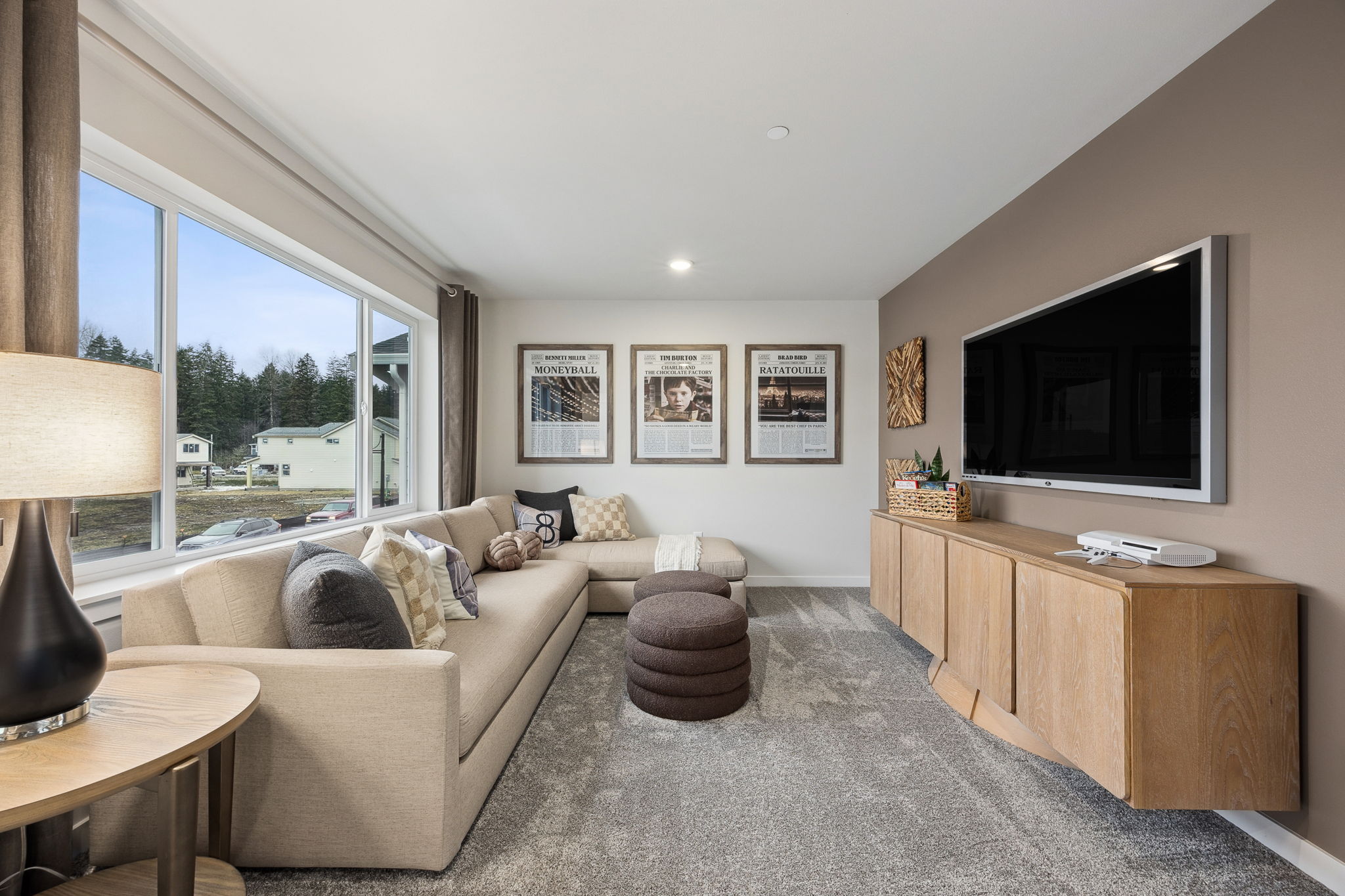 A living room with a tv and couches.