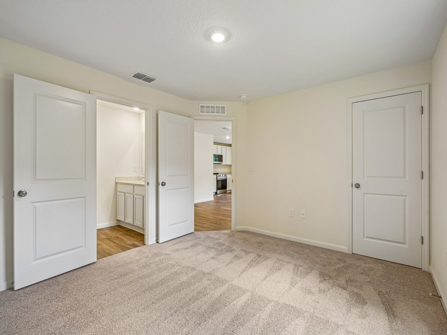 A room with white doors.