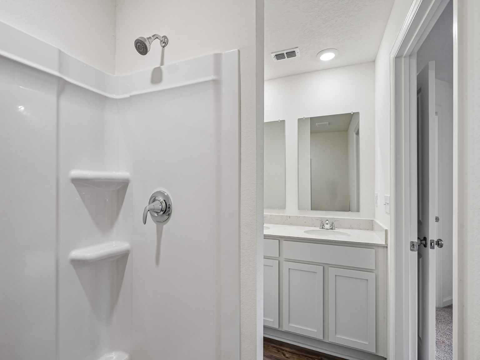 A bathroom with a sink and a toilet.