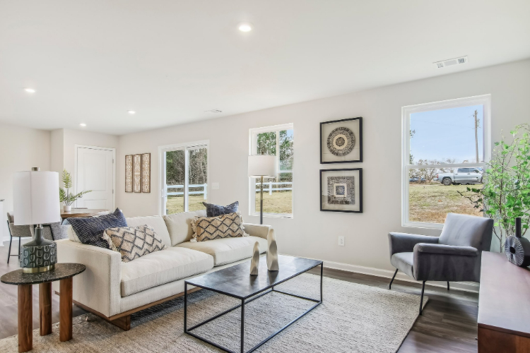 A living room with a large window.