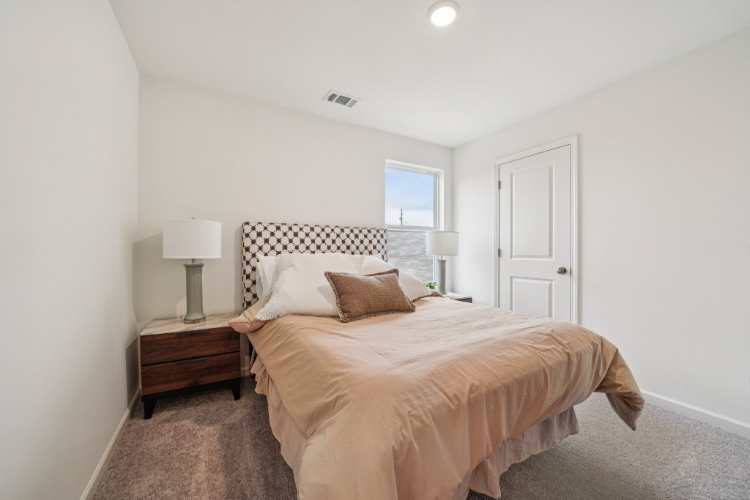 A bed in a bedroom.