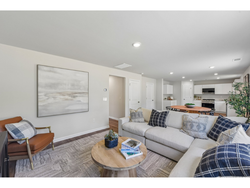 A living room with a couch and a coffee table.