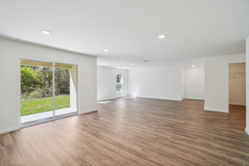 A room with a wood floor and a wood floor.