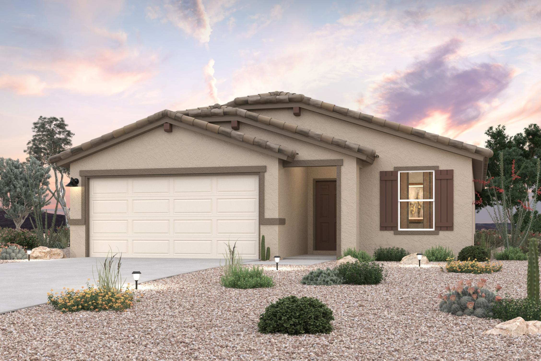 A house with a gravel driveway.