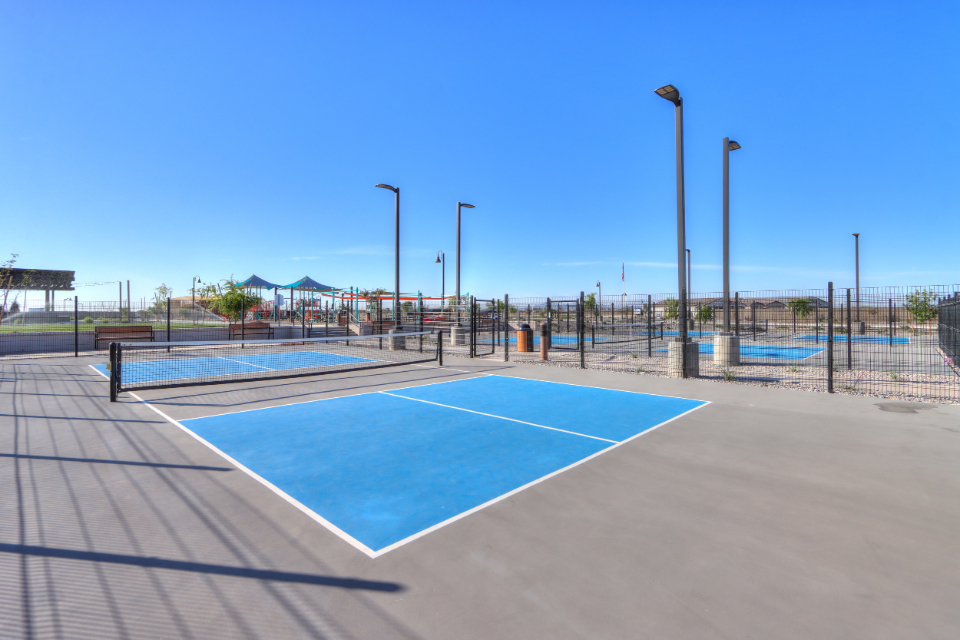 A swimming pool with a fence around it.