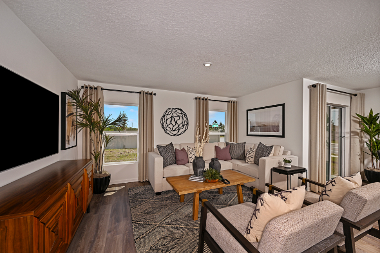 A living room with a large window.