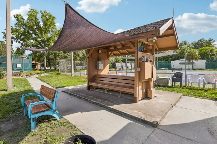 A bench and a picnic table.