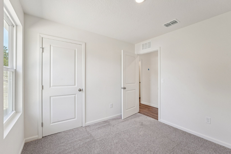 A room with white doors.