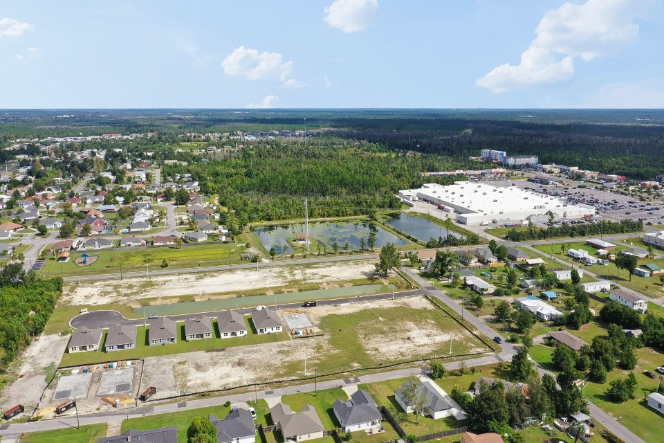 A large area with buildings and trees.