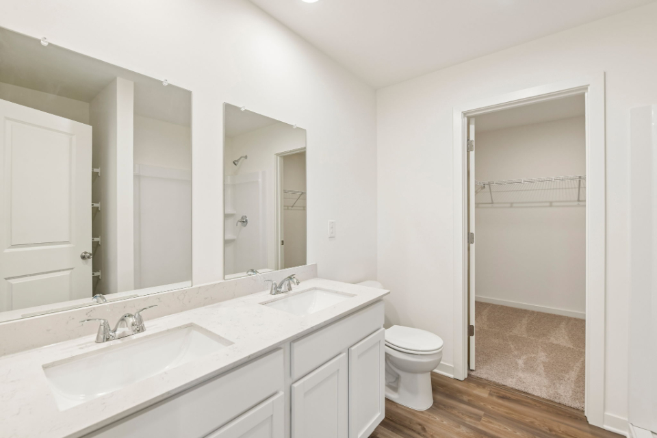 A bathroom with a standup shower.
