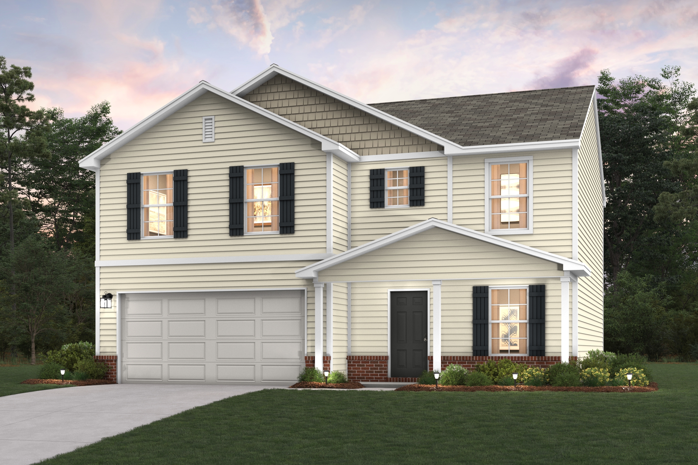 A white house with a driveway.