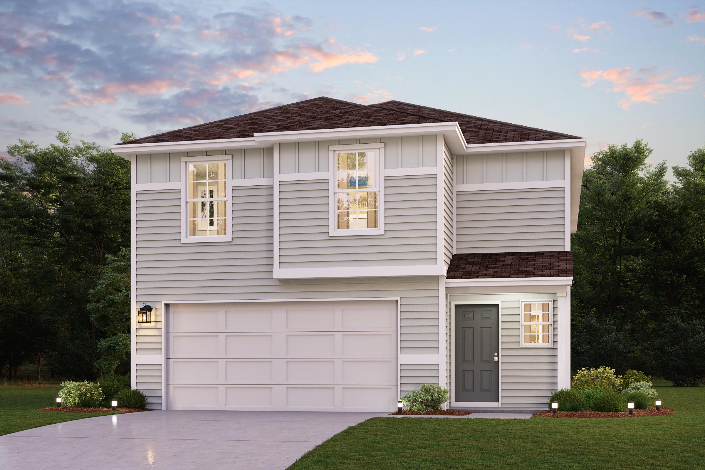 A white house with a garage.