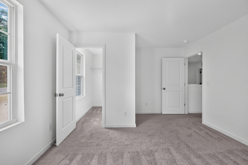 A room with white doors.