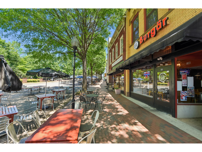 A cafe with tables and chairs.