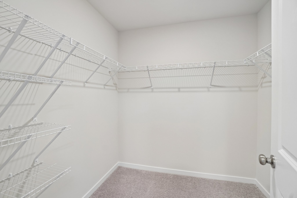 A white hallway with white walls.