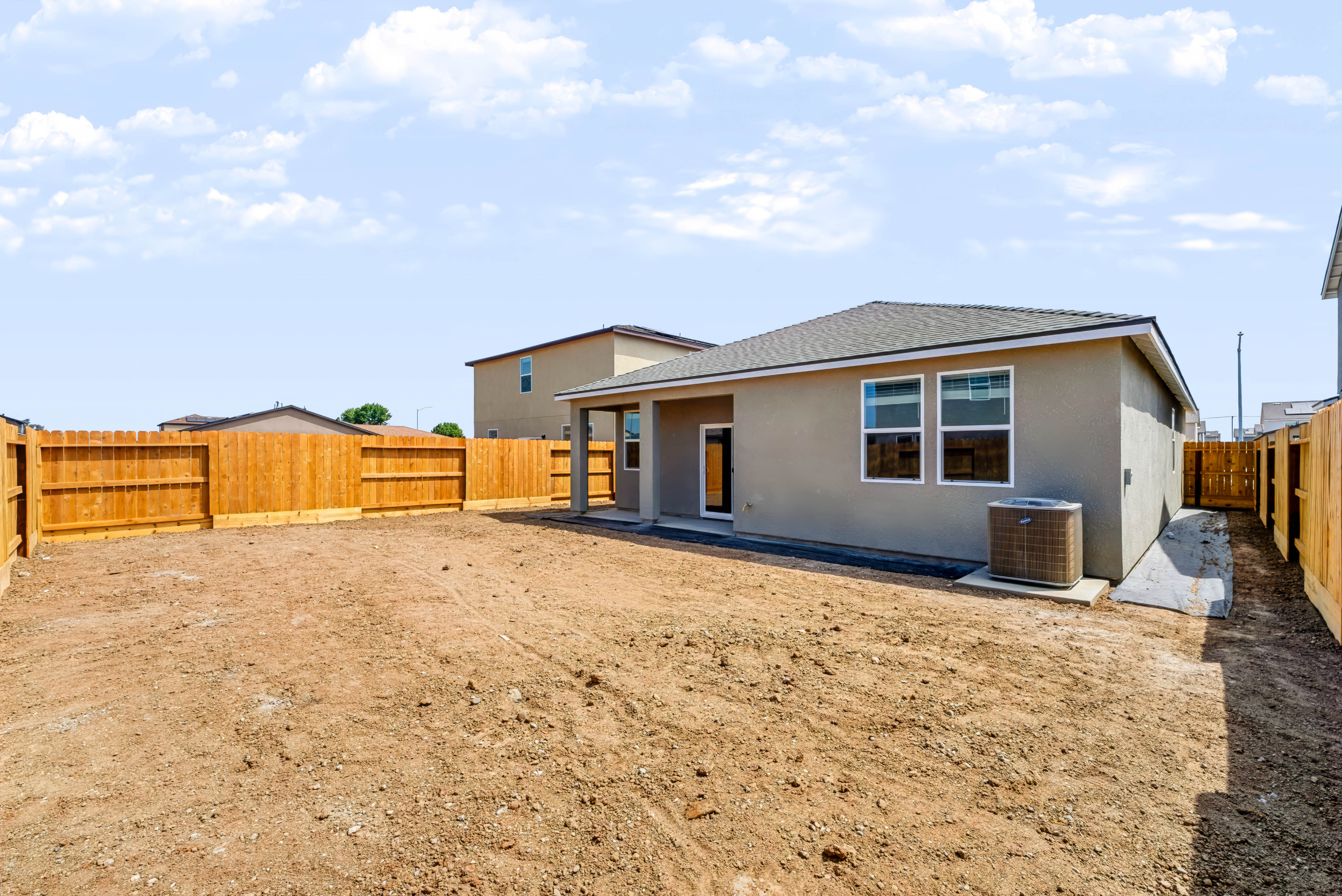 A house with a fence around it.