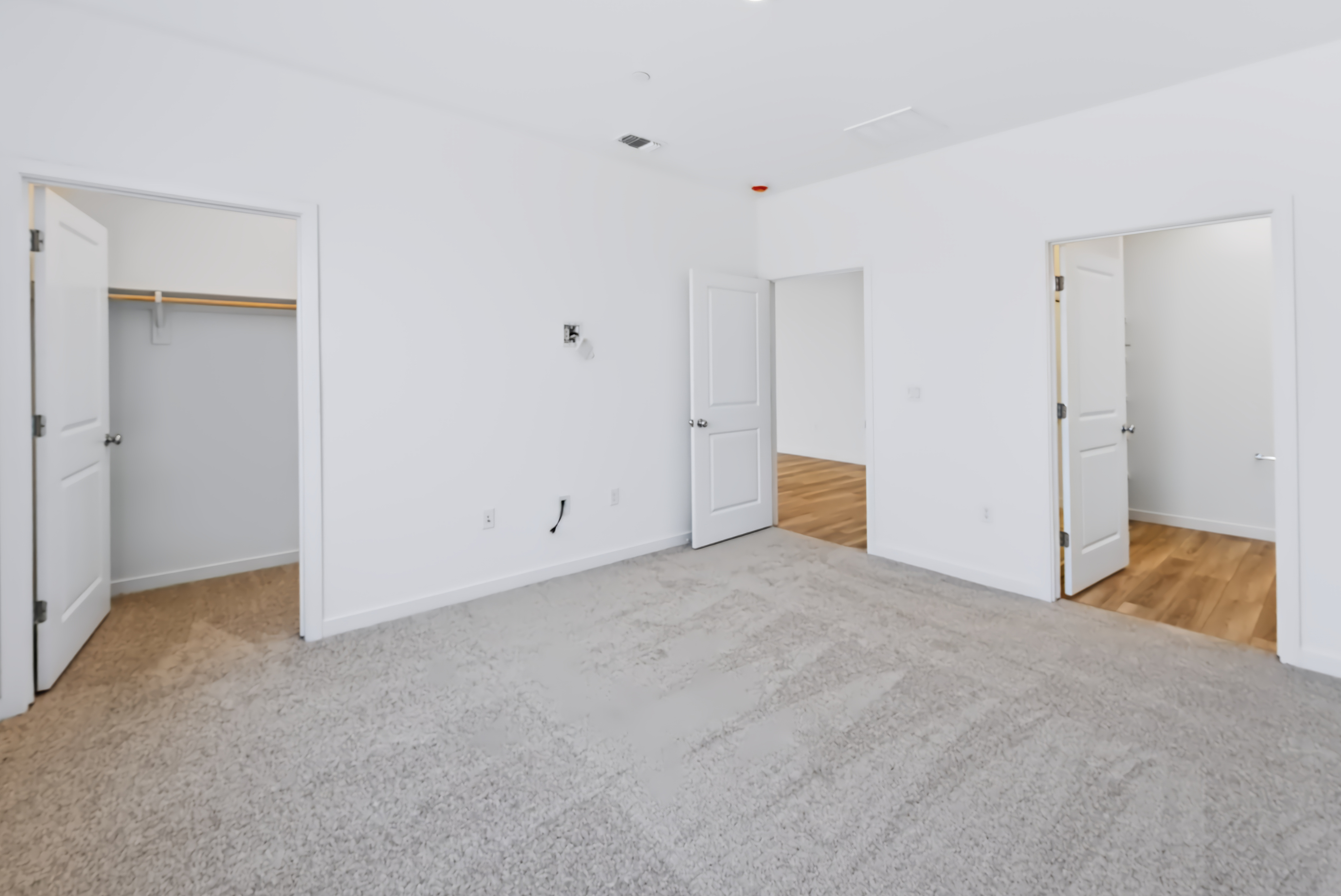A room with white doors.