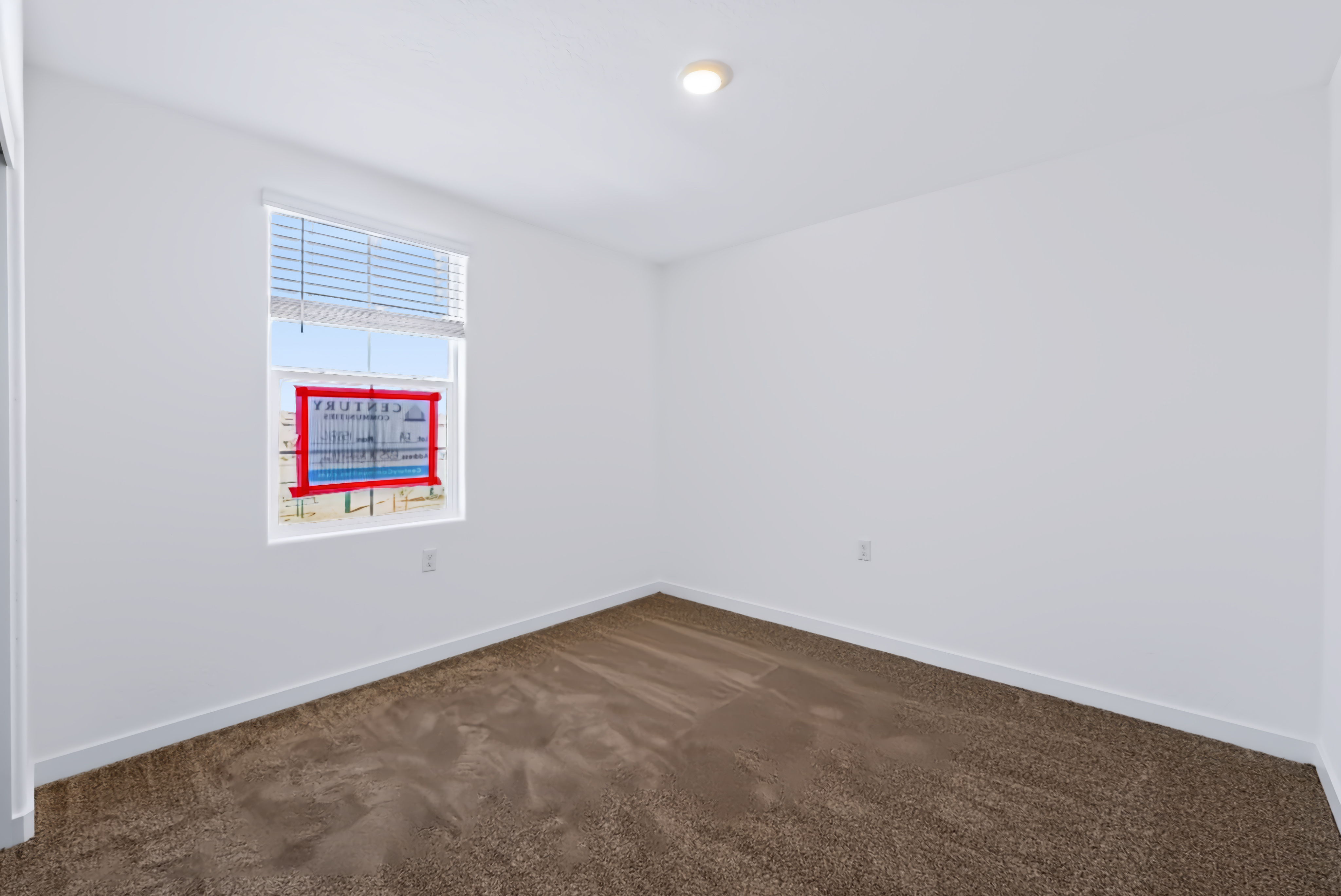 A room with a flag on the wall.