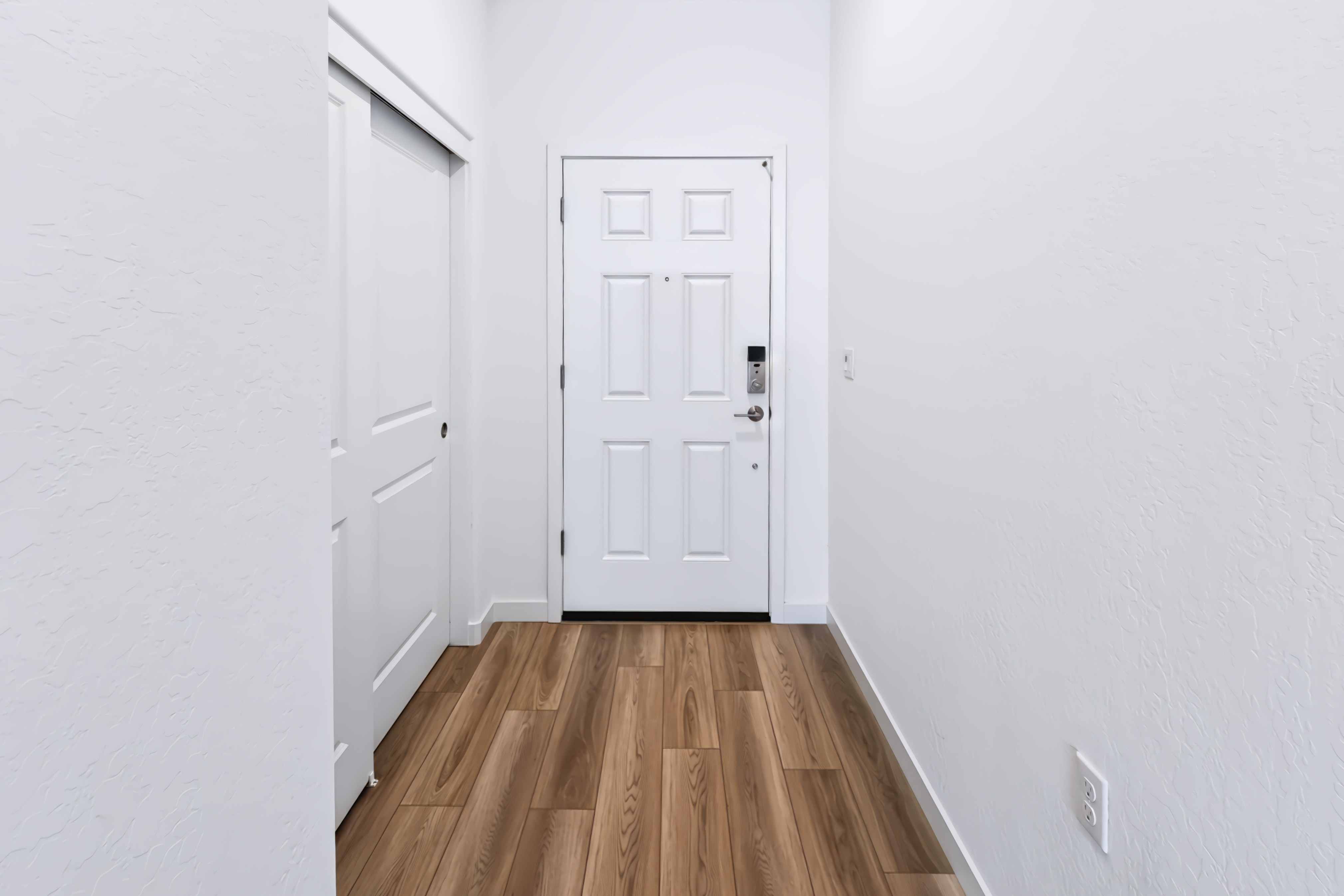 A white door in a room.