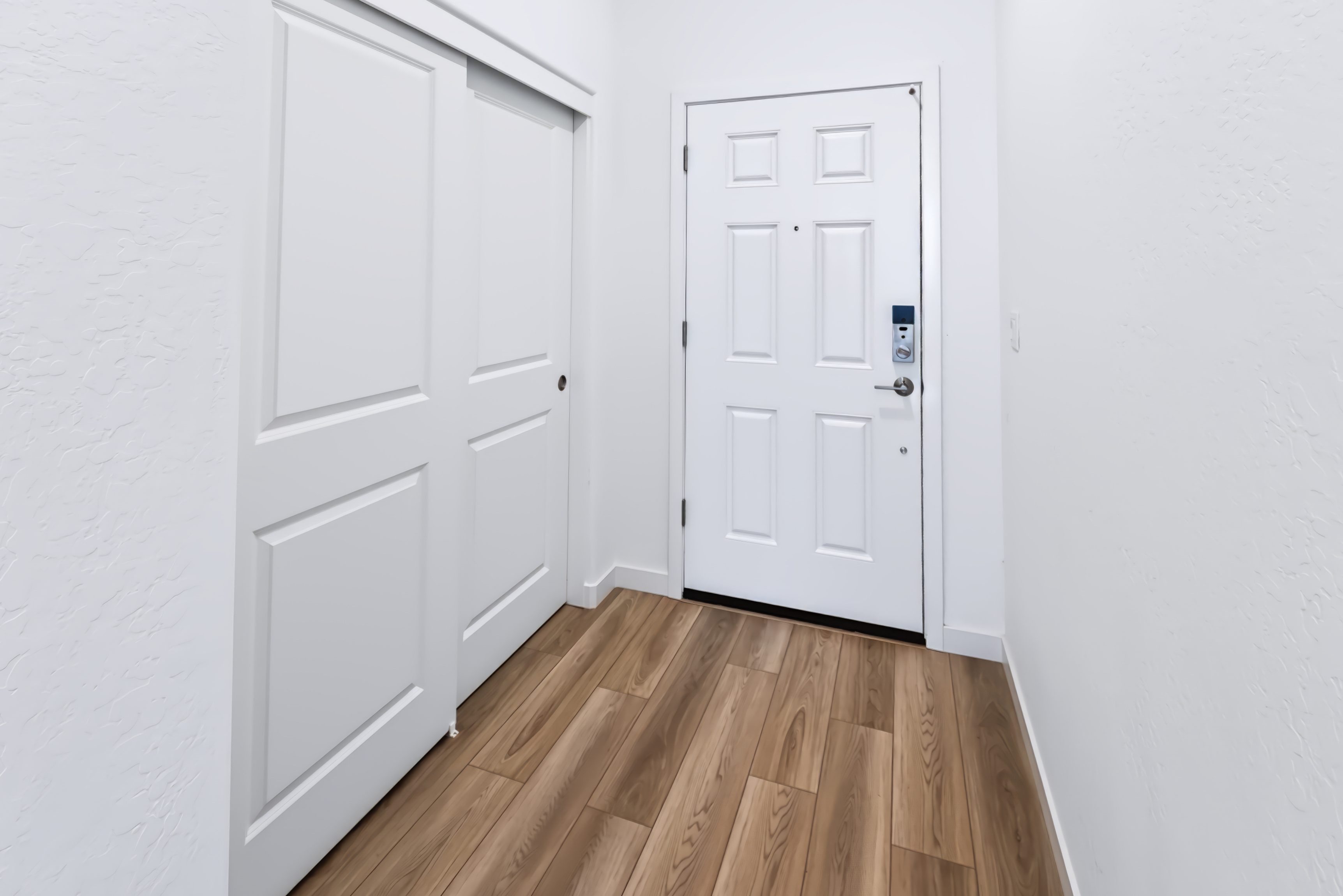 A white door in a room.