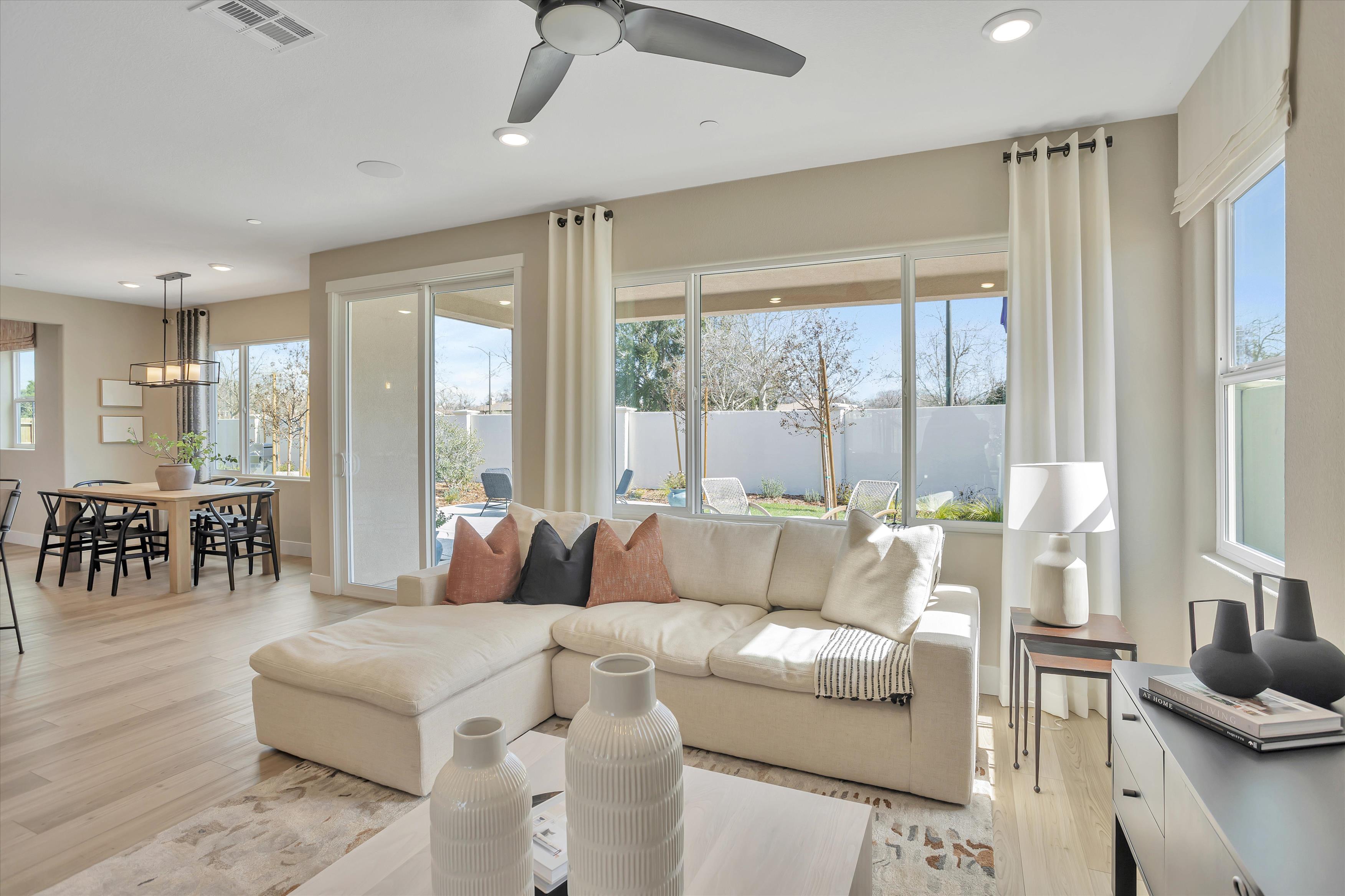 A living room with a large window.