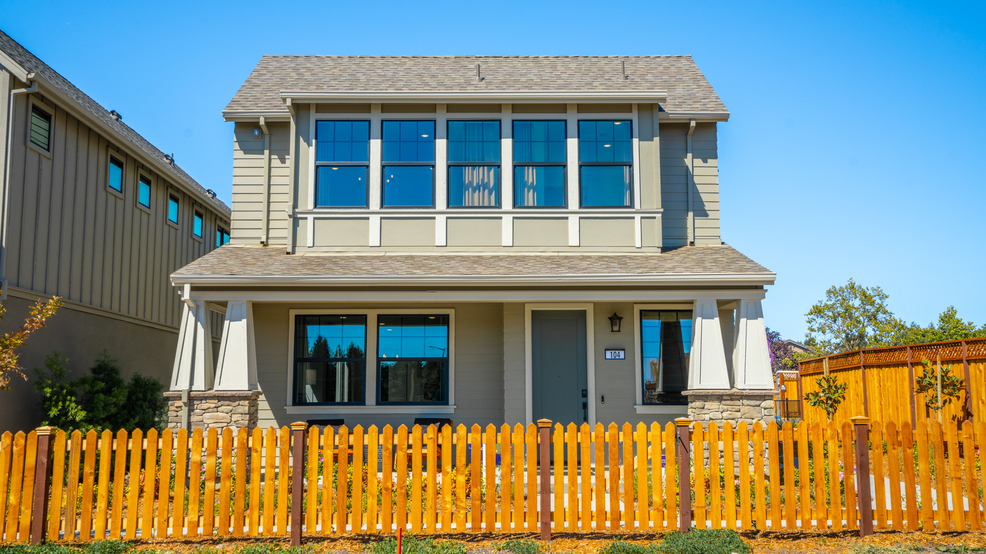 A house with a fence around it.
