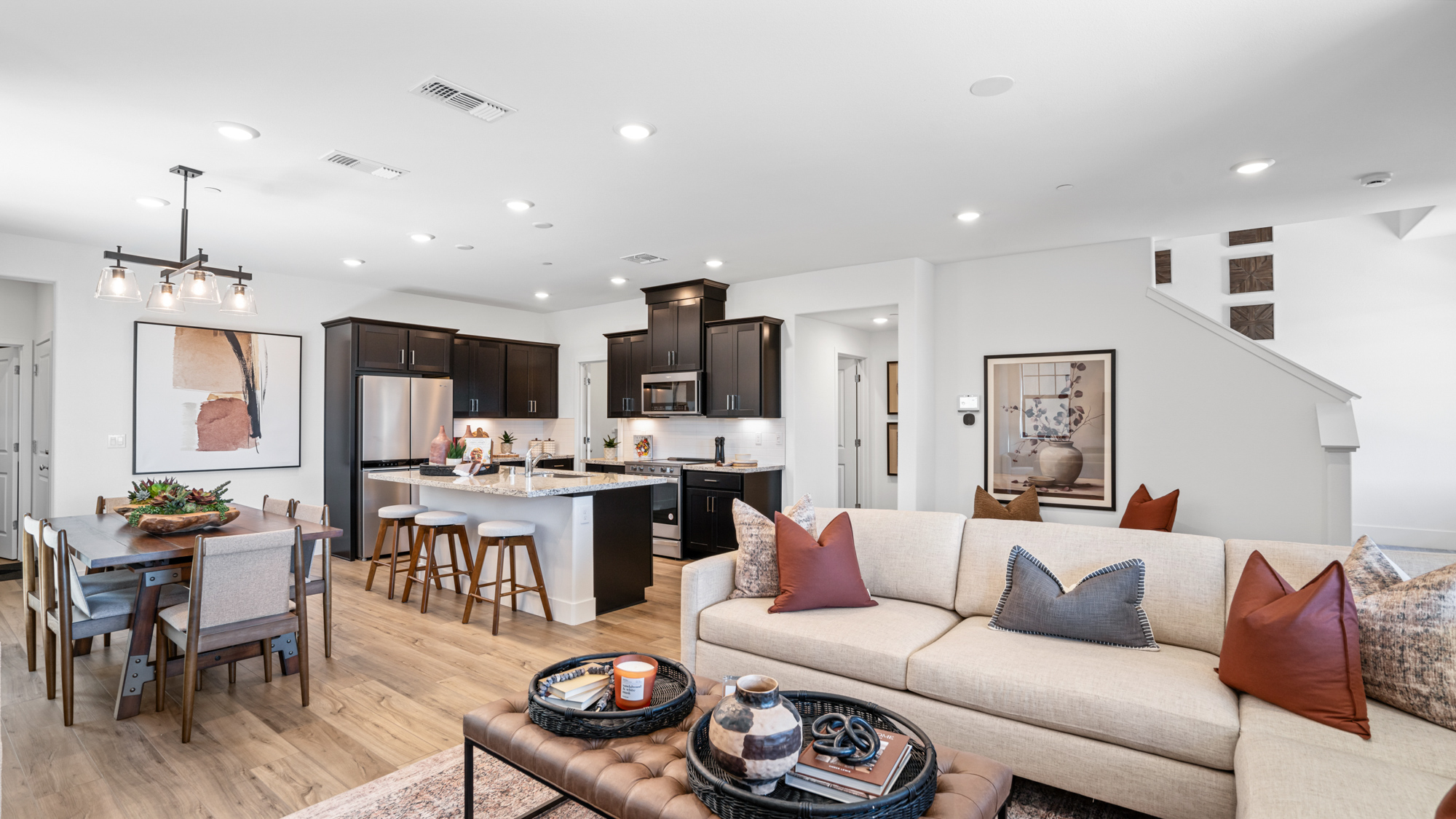 A living room with a couch and a table.